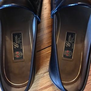 Men’s Gucci black leather loafers